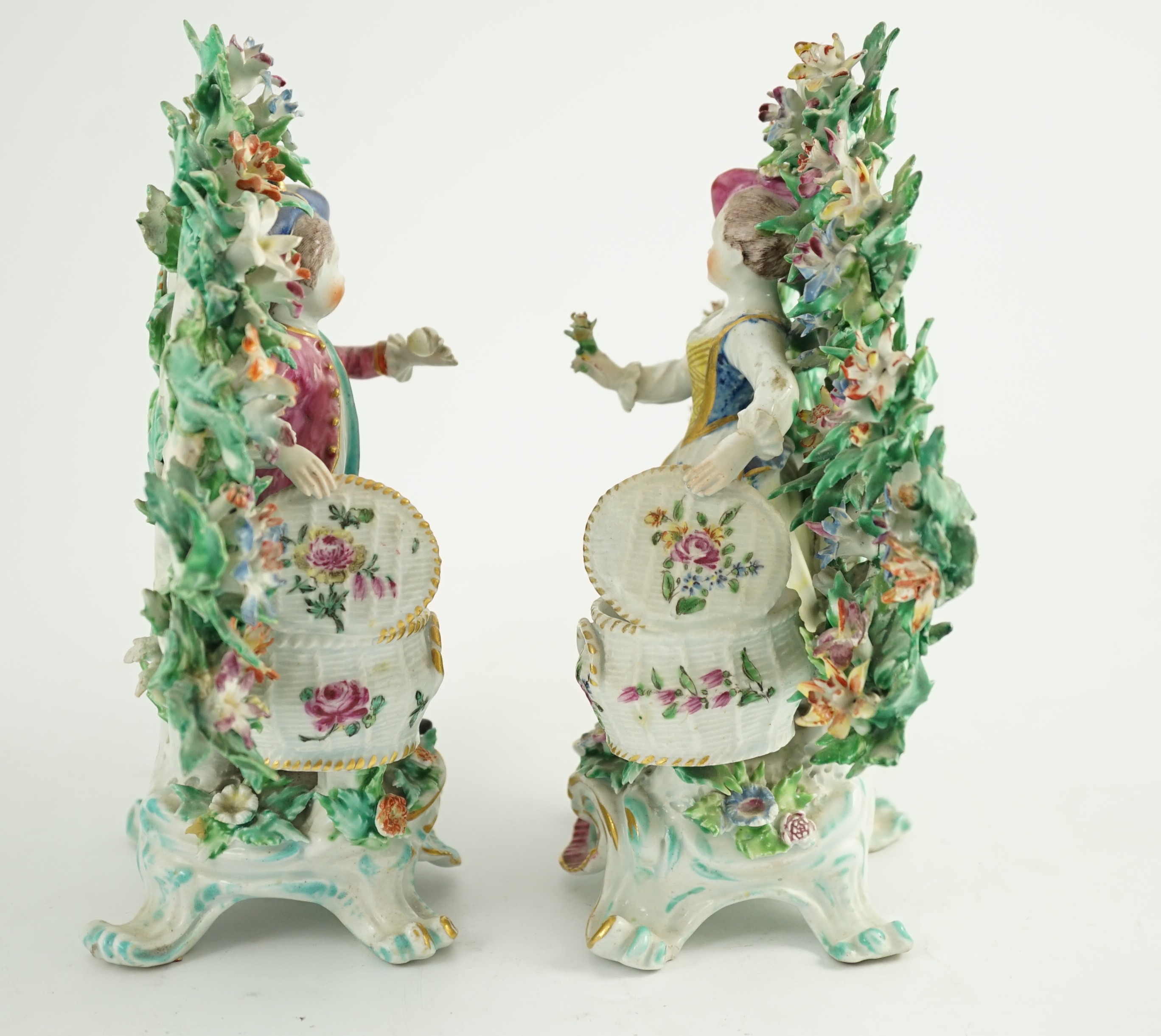 A good pair of Bow porcelain bocage figures, c.1770, 22cm high
